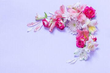 alstroemeriaand chrysanthemums  flowers on violet  background