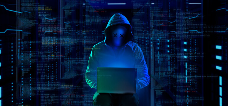 cybersecurity vulnerability Log4J and hacker,coding,malware concept.Hooded computer hacker in cybersecurity vulnerability Log4J on server room background.metaverse digital world technology.