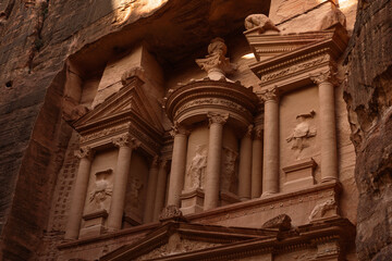 Ancient monument the Treasury in the ancient city of Petra carved in the sandstone on a sunny day