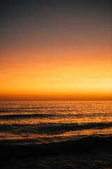 Obraz premium Orange sunset in the ocean