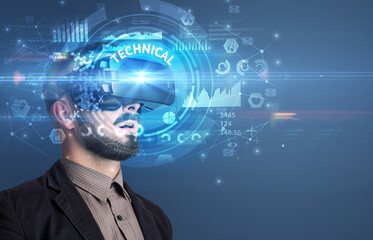 Businessman looking through VR glasses