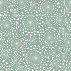 seamless repeat pattern with simple and beautiful heart shape motif giving a dandelion shape on a light sage green background perfect for fabric, scrap booking, wallpaper, gift wrap projects
