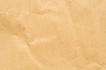 Abstract crumpled and creased recycle brown paper texture background