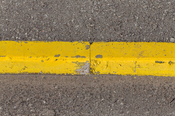 Yellow curb stone border