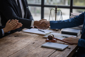Businessman handshake justice and law concept. male lawyer working in office. Legal law, advice and...