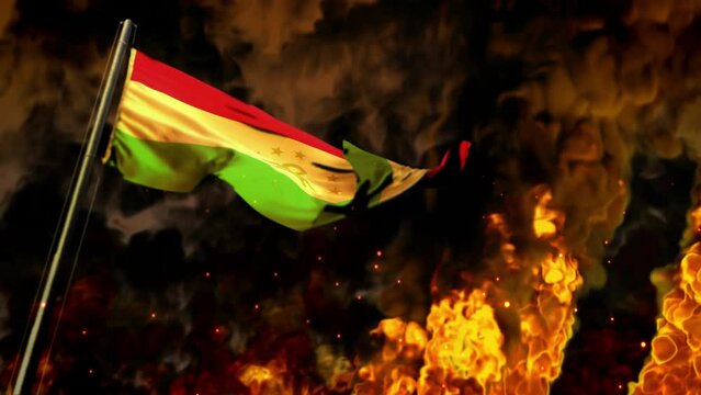 waving Tajikistan flag on burning fire background - catastrophe concept