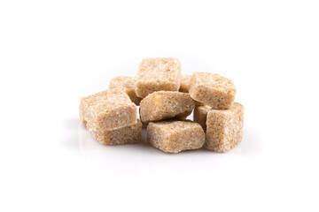 Heap brown sugar cubes isolated