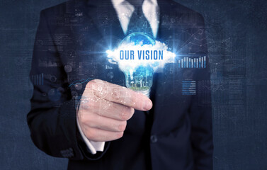 Businessman holding a light bulb, business concept