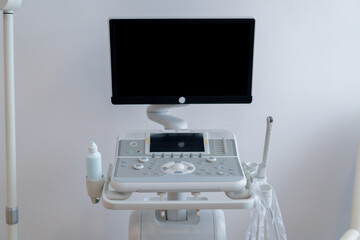 Medical office with ultrasound diagnostic equipment in the health clinic gynecological office