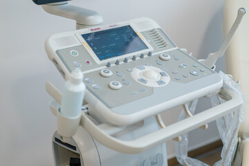 Fototapeta na wymiar Medical office with ultrasound diagnostic equipment in the health clinic gynecological office