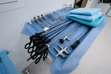 sterile surgical instruments lie on the table before the operation in the operating room laparoscope scalp scissors
