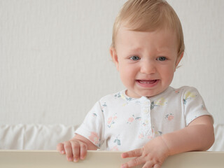 Baby crying in crib