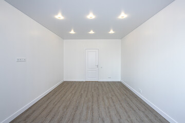 Empty room without furniture with white walls and ceiling