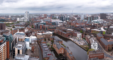 Fototapeta na wymiar Aerial panorama of a Leeds cityscape skyline with Brewery Wharf on the River Aire