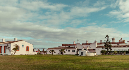 landscape on the beach of Barril with the house  of the former fishermen's huts  in Santa Luzia southern Portugal
Travel Europe Portugal Algarve coast 