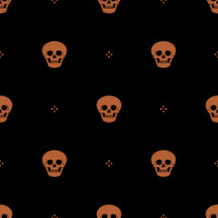 Seamless Halloween pattern with human skulls. Orange silhouettes on black background.