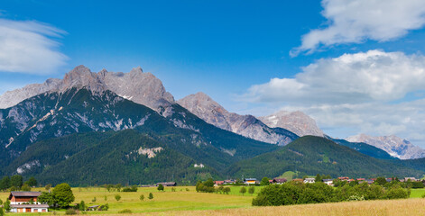 Alps mountain country tranquil summer panorama (Austria, Gosau village outskirts).