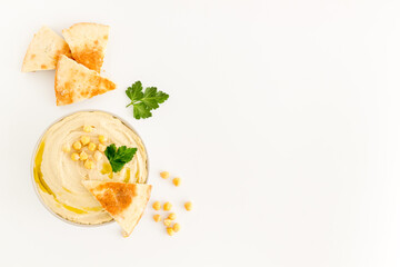 Appetizer made of chickpeas dip hummus with pita croutons
