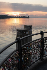 Beautiful sunrise view from Imperia statue at harbor entrance on lake Constance in early morning...
