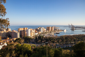 view over Malaga at sunset travel banner