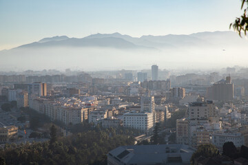 view over Malaga at sunset travel banner