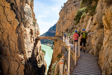 elderly couple trekking in Caminito Del Rey Trail in Andalusia - obrazy, fototapety, plakaty