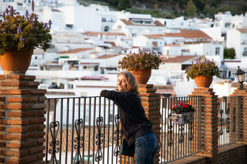 woman strolling in picturesque village of  Mijas. Costa del Sol  Andalusia  Spain
