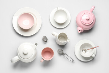Composition with stylish tea set on grey background