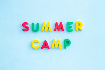 Summer vacation and hike concept. Words Summer Camp made of colorful letters