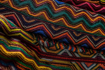 Close-up of a multicolored traditional African textile. generative AI