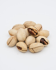 Milk pecan in shell isolated on white background