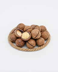 Macadamia nuts on a white background