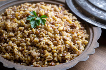 Traditional delicious Turkish foods; bulgur pilaf with green lentils (Turkish name; yesil mercimekli bulgur pilavi)