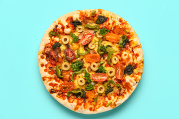 Vegetable pizza on blue background