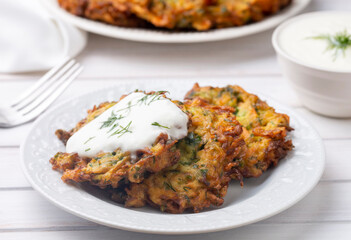 Mucver. Traditional Turkish Zuccini Mucver. Mucver is a Turkish fritter or pancake, made from grated zucchini.