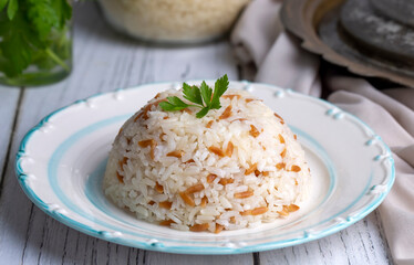 Traditional delicious Turkish food; Turkish style rice pilaf (Turkish name; Arpa sehriyeli pirinc pilavi)