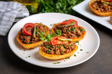 Traditional Turkish food; baked potato dish with minced meat, Turkish name; Patates karniyarik