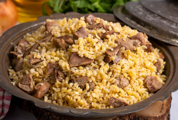 From traditional delicious Turkish cuisine; Bulgur pilaf with meat (Turkish name; etli bulgur pilavi)