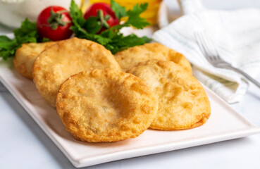 Delicious meat pie from Turkish cuisine. Fried handmade pies. Turkish name; fincan boregi or puf borek