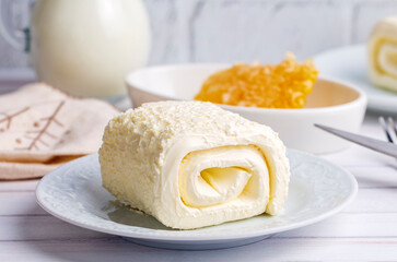 Turkish creamy dairy product. Clotted cream (butter cream) for Turkish breakfast with glass of milk. (Turkish name; kaymak)