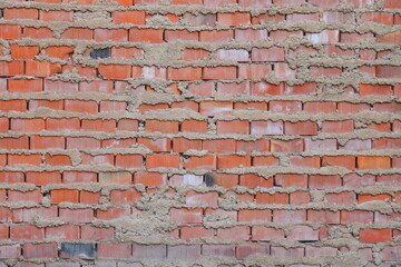 red brick laying, wall of an old building, brick background.