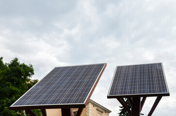 Solar panels on sky background. Concept clean energy, electric alternative, power in nature.