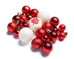 Christmas balls with drawn maple leaf on white background. Canadian flag concept