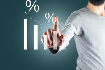 Interest rate and dividend concept, Businessman is calculating .