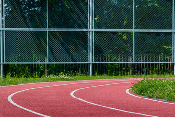 rattan running arch in an open sports facility 
