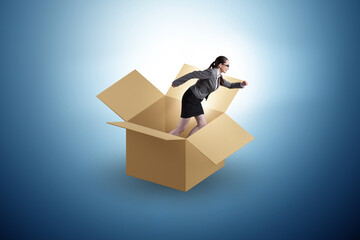 Think out of box concept with businesswoman