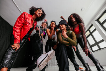 Stylish dance crew in studio.