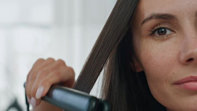 Beautiful woman hairstyling home super closeup. Pov view lady ironing chevelure Generative AI