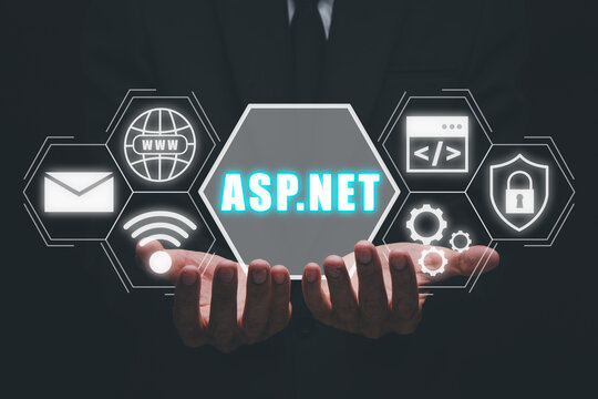 ASP.NET Development programming language concept, Person hand holding ASP.NET icon on virtual screen.