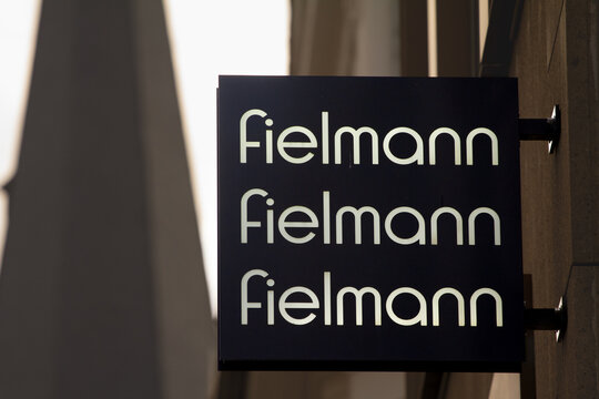 BONN, GERMANY - NOVEMBER 7, 2022: Logo of Fielmann on their store for Bonn. Fielmann is a german chain of optician and eyewear shops and stores selling glasses.